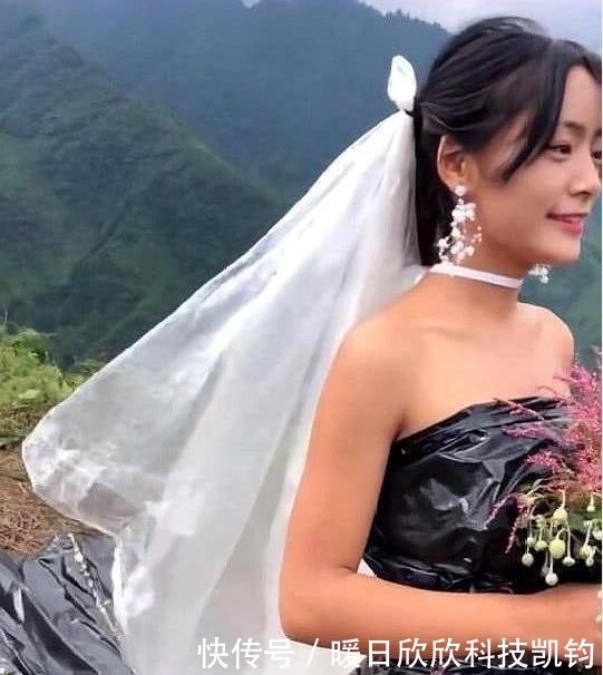  农村|农村女子穿自制的婚纱偶拍照，当镜头往下移的时候，网友大开眼界